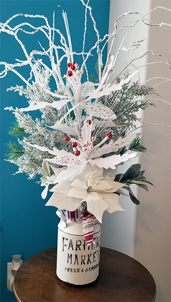 Farmers Market Milk Can with a Holiday Arrangement $45