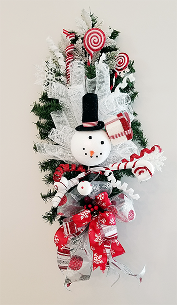 Whimsical Snowman Swag $45